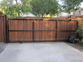 Rear View Cedar Board Batten Automatic Sliding Gate 01