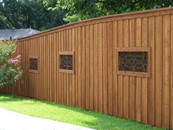 Board on Board Cedar Fence Wrought Iron Niches 01