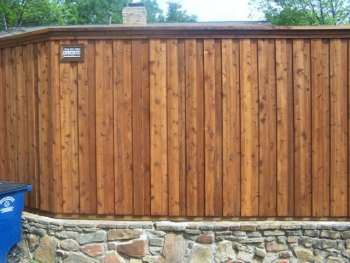 Cap Rail Board on Board Cedar Fence Stone Retaining Wall 02