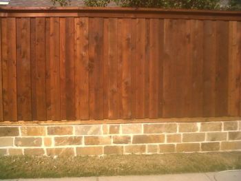 Retaining Brick Wall and Wood Fence