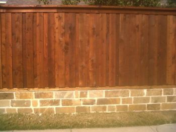 Retaining Brick Wall and Wood Fence