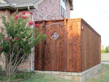 Retaining Flagstone Wall and Wood Fence