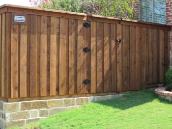 Wood Fence on top of a retaining Wall