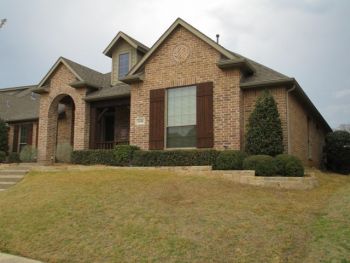 Brick house with Retaining Wall