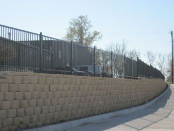 Iron Fence on Retaining Wall