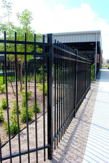 Vertical black steel fence