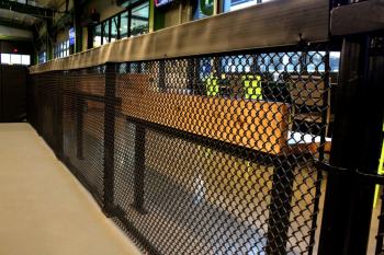 Indoor chain-link fencing