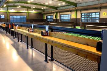 Indoor court divider fencing with wood countertop
