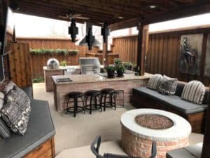 Outdoor features - outdoor living space with fire pit and outdoor kitchen