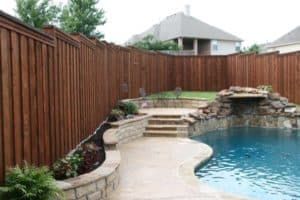 hardscaping in backyard with pool