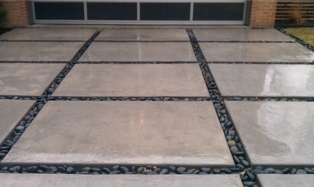 Concrete - brushed concrete tiles with rock filling details