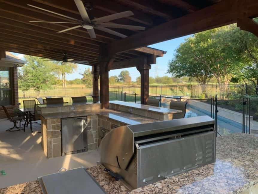 outdoor kitchen space - outdoor kitchen near pool area