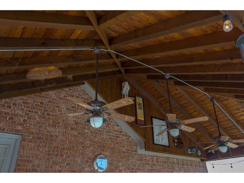 patio cover and pergola perks - patio cover shading home with fans