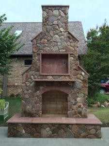 Outdoor Fire Features - Free standing outdoor rock fireplace