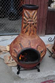 outdoor fire features - clay chiminea