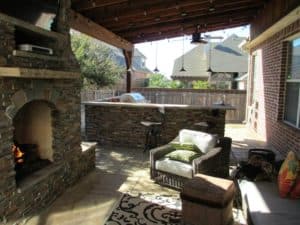 outdoor entertainment - outdoor living space with textiles and tv