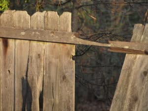 leaning fence - wood fence damaged and leaning