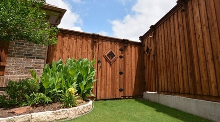 Covid-19 - Stained wood fence with iron details