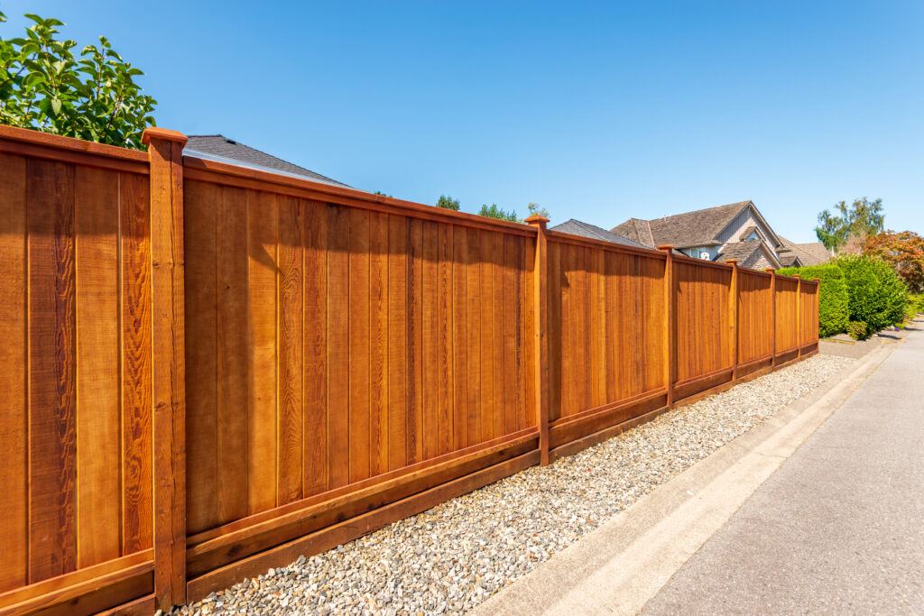 Stained Wood Fence by Texas Best Fence & Patio