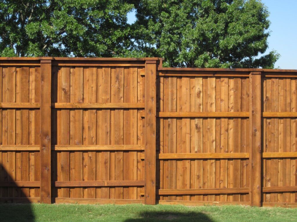 Stained Board on Board Fence by Texas Best Fence & Patio - How Much to Stain Wood Fence