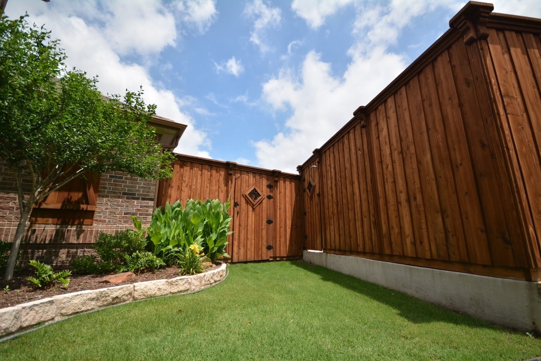 stained fence and gate