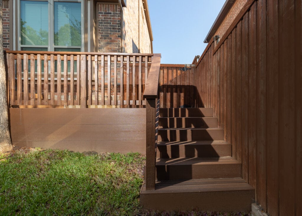 Fence with stairs and a patio built in - 9 Essential Tips for Building a Fence