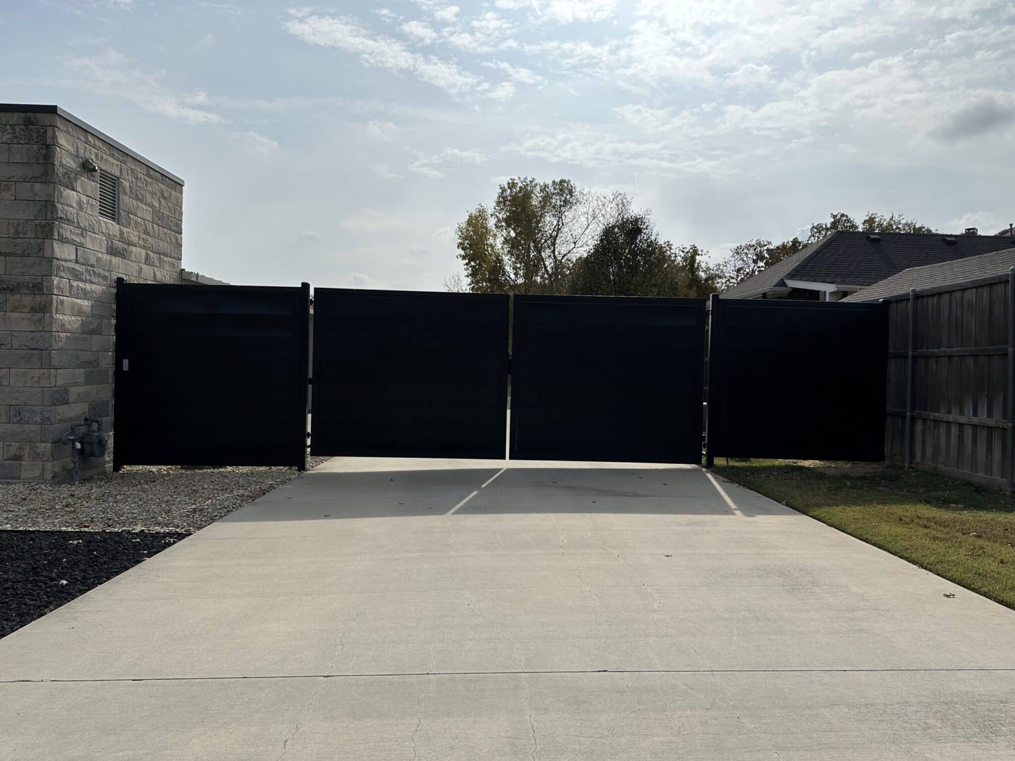 Automatic driveway gate installed at a DFW residential entrance