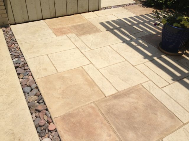 outdoor kitchen flooring - brushed stamped concrete floors in outdoor kitchen